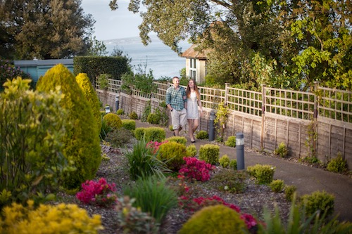 Walkers on the path through the clifftop gardens