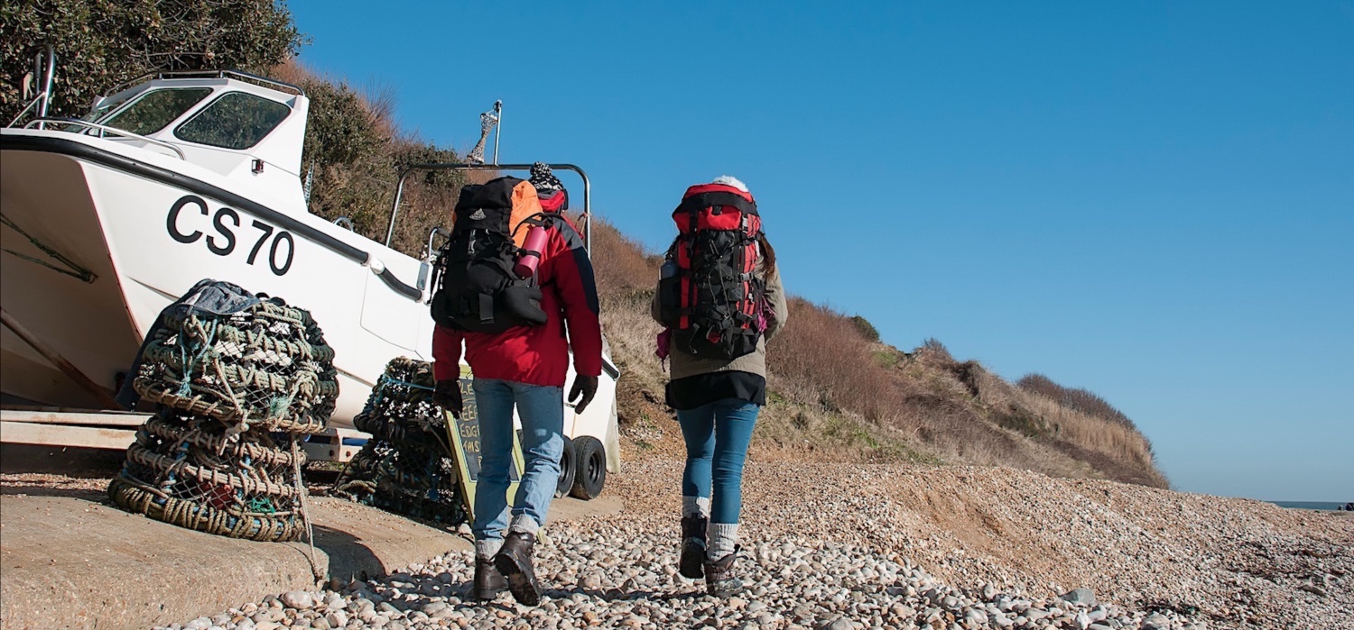 Walkers on a winter coastal path on the Isle of Wight