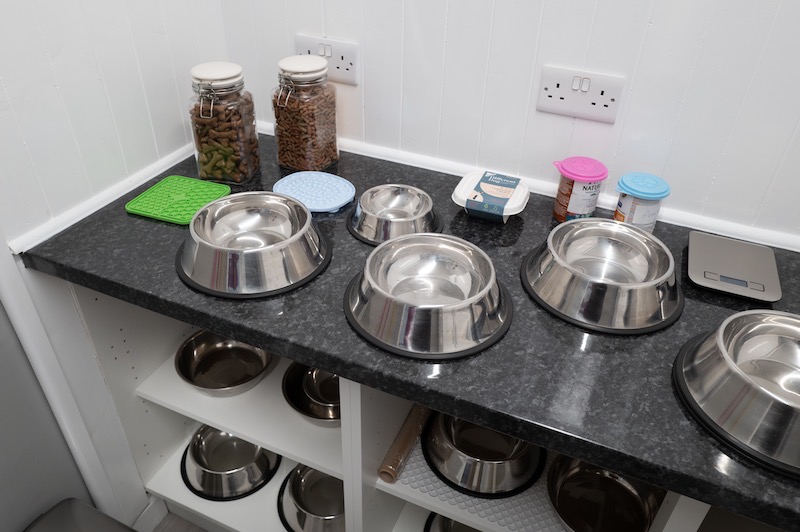 Jars of dog treats and bowls in the Manor's doggy kitchen